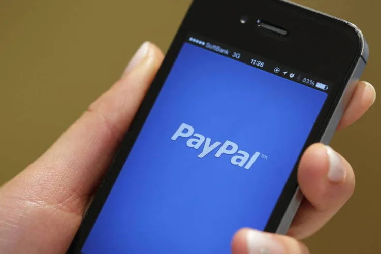 
	App do PayPal em um iPhone: empresa busca novas fontes de receita em meio a uma maior concorr&ecirc;ncia de provedores de pagamentos m&oacute;veis
 (Kiyoshi Ota/Bloomberg)