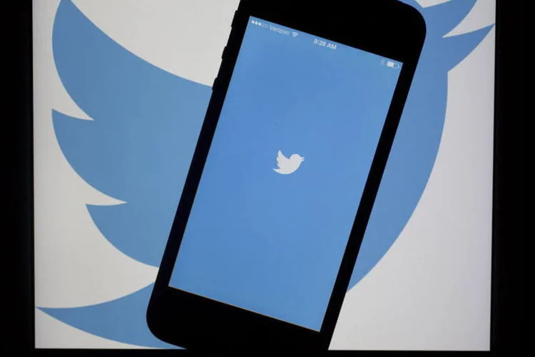 
	Aplicativo do Twitter em um iPhone 5s da Apple
 (Andrew Harrer/Bloomberg)