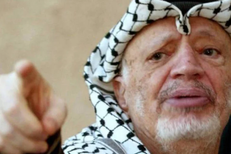 
	O hist&oacute;rico l&iacute;der palestino Yasser Arafat: as autoridades palestinas que dirigem o processo asseguraram que pretendem saber tudo o que rodeou as circunst&acirc;ncias da morte
 (Jamal Aruri/AFP)