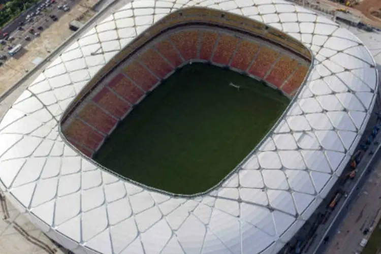 
	Vista a&eacute;rea da Arena da Amaz&ocirc;nia, pronta para receber os jogos da Copa do Mundo: s&atilde;o 199.519 t&iacute;quetes para 54 dos 64 jogos da competi&ccedil;&atilde;o
 (REUTERS/Bruno Kelly)