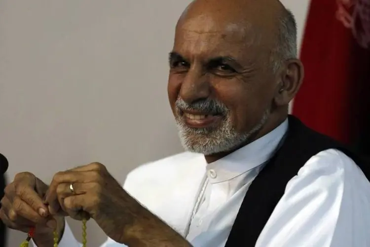 Ashraf Ghani Ahmadzai : candidados se reuniram para uma negociação de última hora nesta segunda-feira (Omar Sobhani/Reuters)