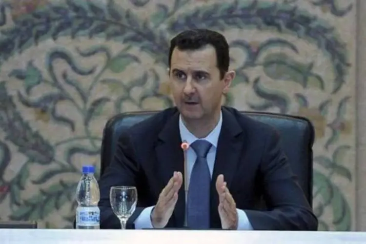 O presidente Bashar al-Assad: Anúncio ocorre seis dias após a deserção do general sírio Manaf Tlass, comandante da Guarda Republicana e próximo à família Assad (Sana/Divulgação/Reuters)
