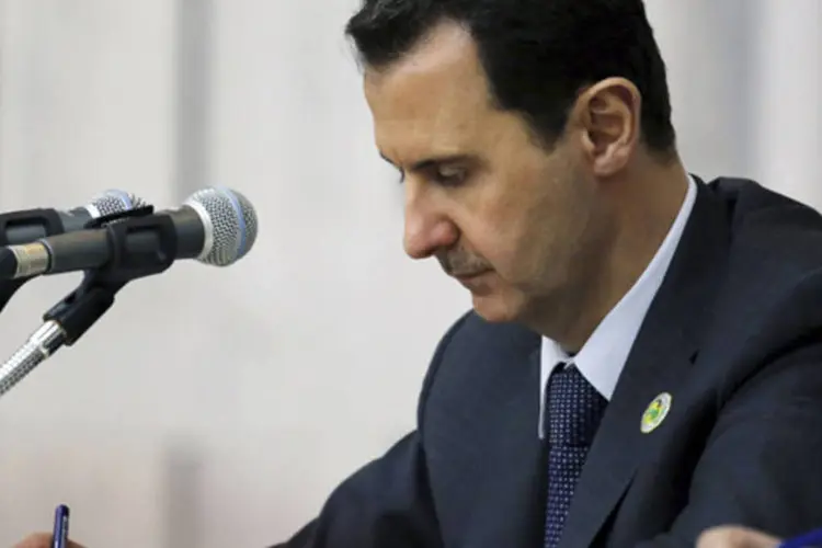 Presidente sírio, Bashar al-Assad, durante o 67 º aniversário da fundação do partido Baath, em Damasco (SANA/Divulgação via Reuters)