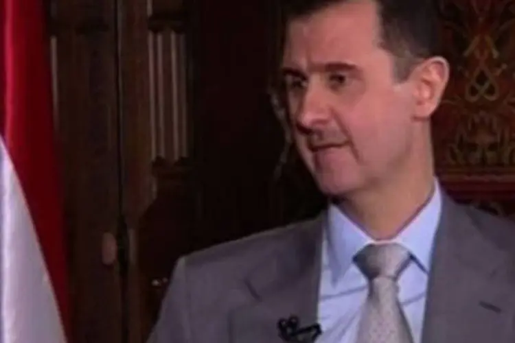 O presidente sírio Bashar al-Assad durante a entrevista ao canal Russia Today
 (Russia Today/AFP)