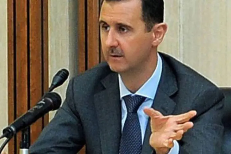 
	O presidente s&iacute;rio Bashar al-Assad: EUA e seus aliados ocidentais e do Golfo P&eacute;rsico discordam da postura da R&uacute;ssia e de seus apoiadores regionais, incluindo o Ir&atilde;
 (AFP)