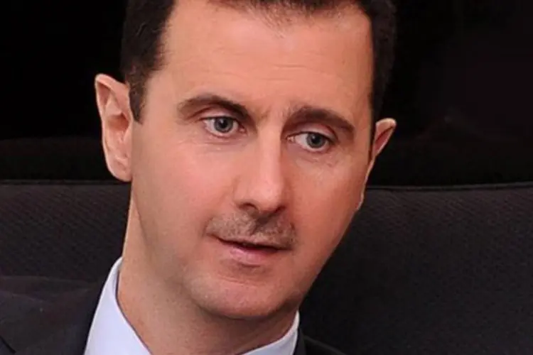 
	O presidente s&iacute;rio, Bashar al-Assad, parecia confidente e relaxado durante discurso
 (©AFP/Sana/File)