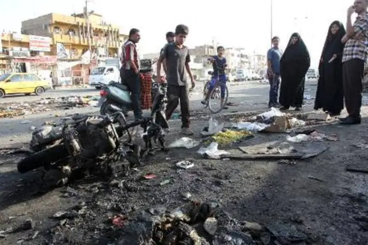 
	Explos&atilde;o de carro-bomba em Bagd&aacute;
 (Ali Al-Saadi/AFP)