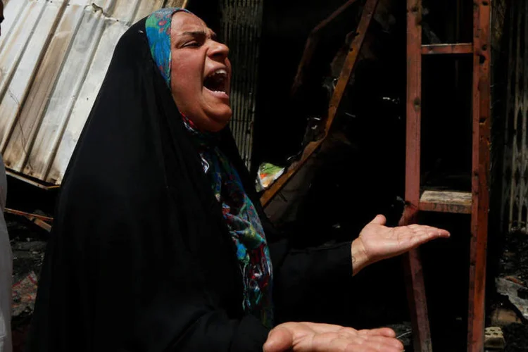 
	Ataque: outro atentado no bairro de maioria xiita de Al Kazemiya provocou a morte de pelo menos 17 pessoas e deixou outras 43 feridas
 (Wissm al-Okili / Reuters)