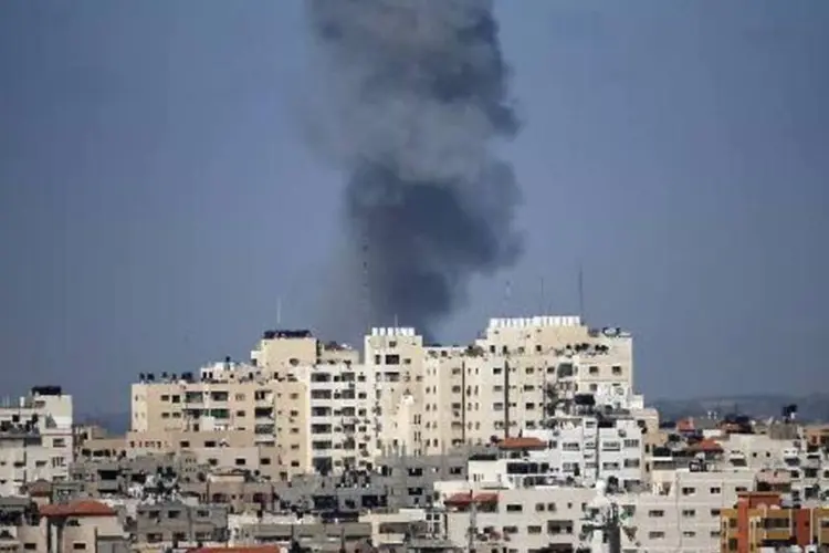 
	Pr&eacute;dio atingido por ataque a&eacute;reo israelense, na Faixa de Gaza
 (Thomas Coex/AFP)