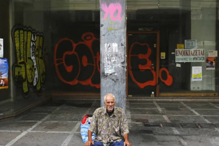 
	&nbsp;

	Parlamento grego aprovou um or&ccedil;amento de austeridade para 2013 para atender &agrave;s condi&ccedil;&otilde;es para a libera&ccedil;&atilde;o da pr&oacute;xima parcela de empr&eacute;stimos (Yannis Behrakis/Reuters)