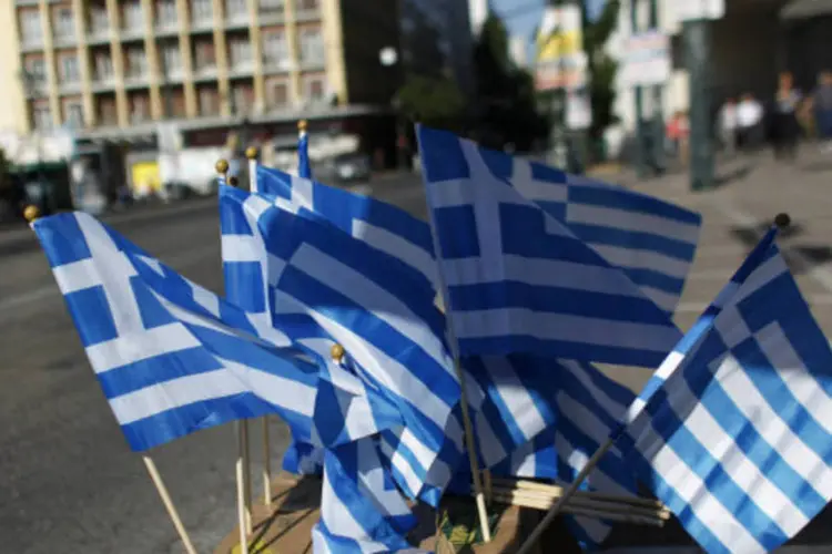 
	Bandeiras da Gr&eacute;cia: Atenas far&aacute; o poss&iacute;vel para chegar a um acordo com a troica
 (Kostas Tsironis/Bloomberg)