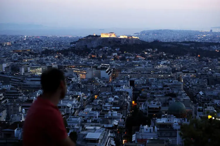 
	Atenas, na Gr&eacute;cia, iluminada &agrave; noite com o Parthenon no fundo: o clima de otimismo nos preg&otilde;es europeus em rela&ccedil;&atilde;o &agrave; Gr&eacute;cia permanece
 (Angelos Tzortzinis/Bloomberg)