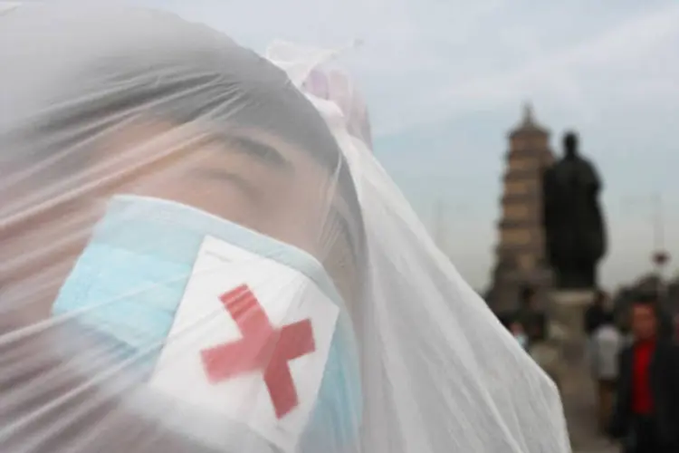 
	China: pesquisa cient&iacute;fica tamb&eacute;m calcula que at&eacute; 2020 ser&atilde;o registrados 800 mil novos casos de pacientes com c&acirc;ncer pulmonar ao ano
 (ChinaFotoPress/Stringer)