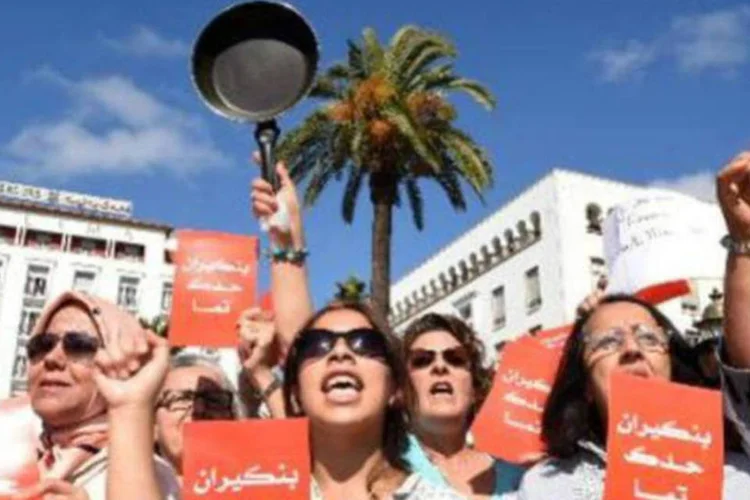 Ativistas e líderes marroquinas em ato: comentários de Benkirane levaram a um clamor público (AFP)