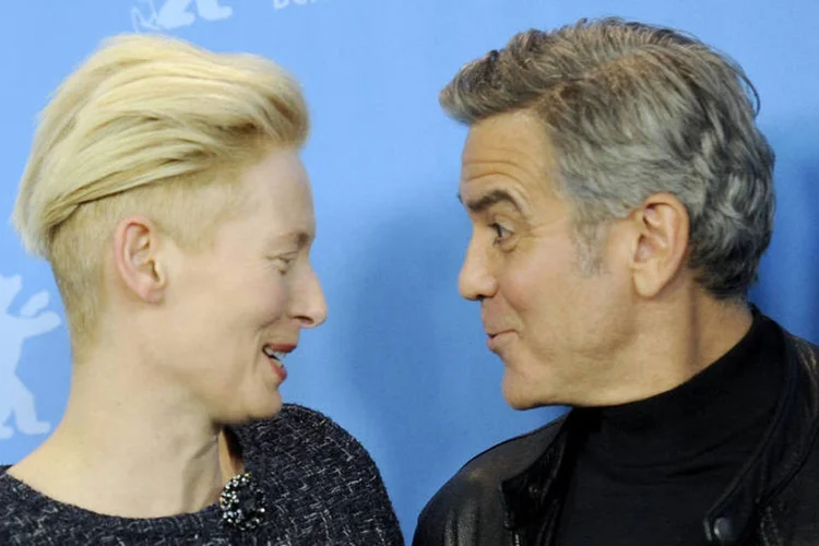 
	George Clooney e Tilda Swinton, de &quot;Ave, C&eacute;sar!&quot;: o j&uacute;ri presidido por Meryl Streep vai eleger a melhor das 18 produ&ccedil;&otilde;es que disputam o Urso de Ouro
 (Stefanie Loos / Reuters)