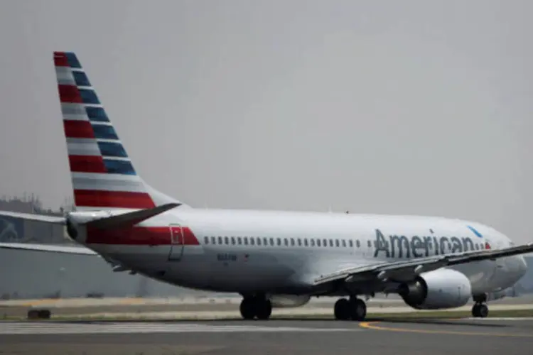 
	Avi&atilde;o da American Airlines: companhia afirmou ainda que &quot;o voo foi reabastecido, seguiu para Miami e pousou hoje, tr&ecirc;s de fevereiro, &agrave;s 6h32 (hor&aacute;rio de Miami)&quot;
 (Brent Lewin/Bloomberg)
