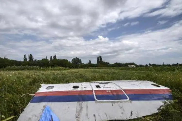 
	Fuselagem de um avi&atilde;o da Malaysia Airlines que caiu na Ucr&acirc;nia
 (Bulent Kilic/AFP)