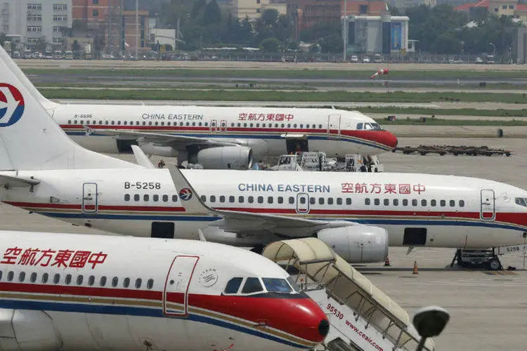 Aviões chineses: Pequim e outras 22 cidades chinesas impuseram medidas de emergência relacionadas à poluição neste sábado (Aly Song/Reuters)