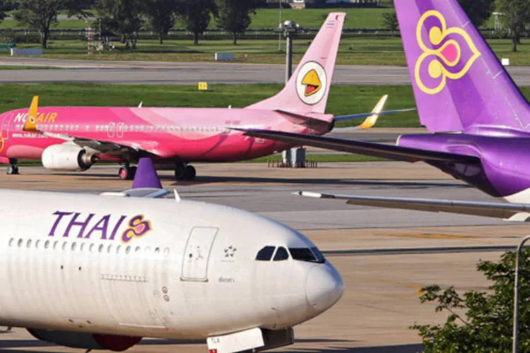 
	A companhia a&eacute;rea estatal cancelou seus voos diretos de Bangcoc para Los Angeles em 2012, acrescentando uma escala em Seul. Quatro anos antes, a companhia a&eacute;rea cancelou seu servi&ccedil;o direto para Nova York
 (Dario Pignatelli/Bloomberg)