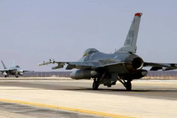 
	F-16: avi&otilde;es de for&ccedil;as a&eacute;reas da Noruega e de Portugal interceptaram os avi&otilde;es russos
 (SSgt Tyler McLain/AFP)