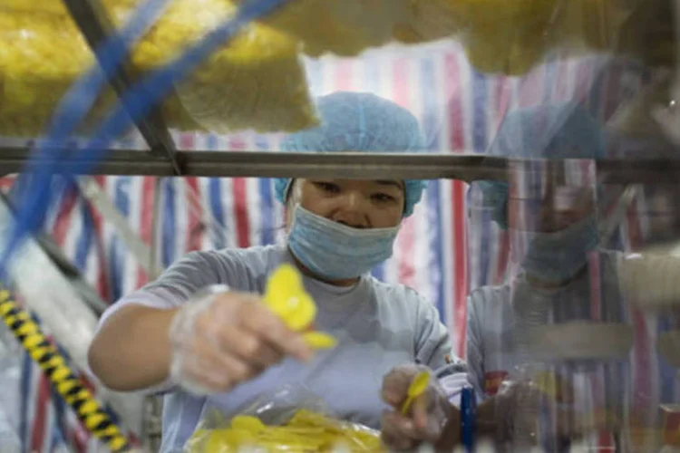 
	F&aacute;brica na China: regras acabam com a necessidade de capital social m&iacute;nimo para companhias de responsabilidade limitada e sociedades an&ocirc;nimas&nbsp;
 (Brent Lewin/Bloomberg)