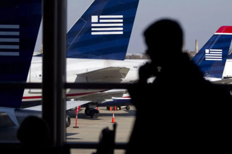 
	Viajante passa por avi&otilde;es da US Airways: gafe de grandes propor&ccedil;&otilde;es no Twitter
 (Andrew Harrer/Bloomberg)