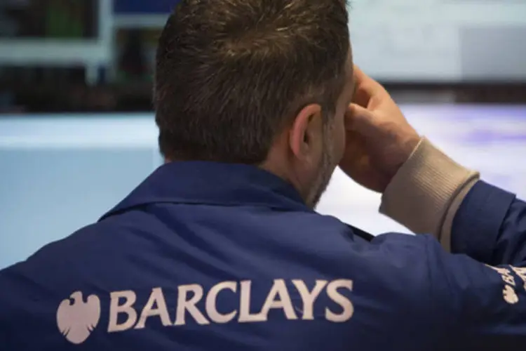 Operador da Barclays na Bolsa de Valores de Nova York (NYSE): banco também terá que distribuir US$ 34,9 mi de lucro para os estados da Califórnia, Arizona, Oregon e Washington (Scott Eells/Bloomberg)