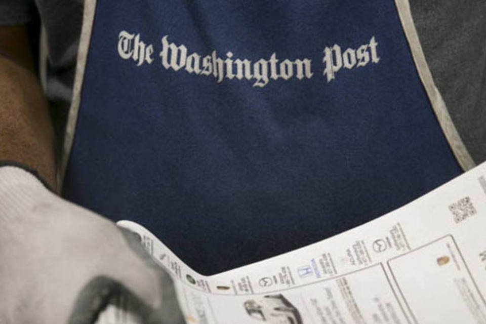 
	Funcion&aacute;rio do Washington Post: Bezos fechou acordo para adquirir o jornal por US$ 250 mi em agosto de 2013
 (Andrew Harrer/Bloomberg)