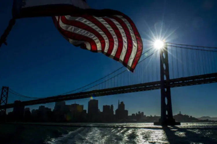 
	Bandeira dos EUA: para muitos analistas, a melhora no terceiro trimestre esconde avan&ccedil;os modestos
 (David Paul Morris/Bloomberg)