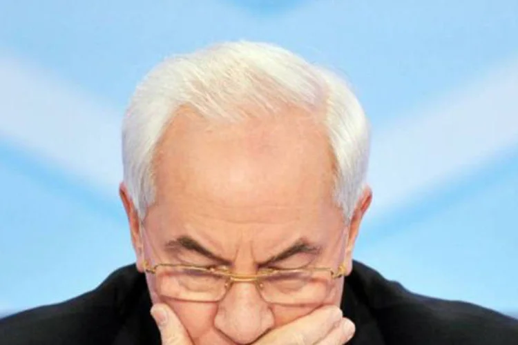 
	Mykola Azarov: &quot;governo tem informa&ccedil;&atilde;o de que est&aacute; sendo preparado o ataque ao edif&iacute;cio do Parlamento&quot;, disse Azarov
 (©AFP / Sergei Supinsky)