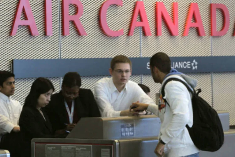 
	Balc&atilde;o da Air Canada no aeroporto de Montreal: companhia ampliou sua rede internacional e sua capacidade para fazer frente &agrave; competi&ccedil;&atilde;o mais intensa
 (Getty Images)