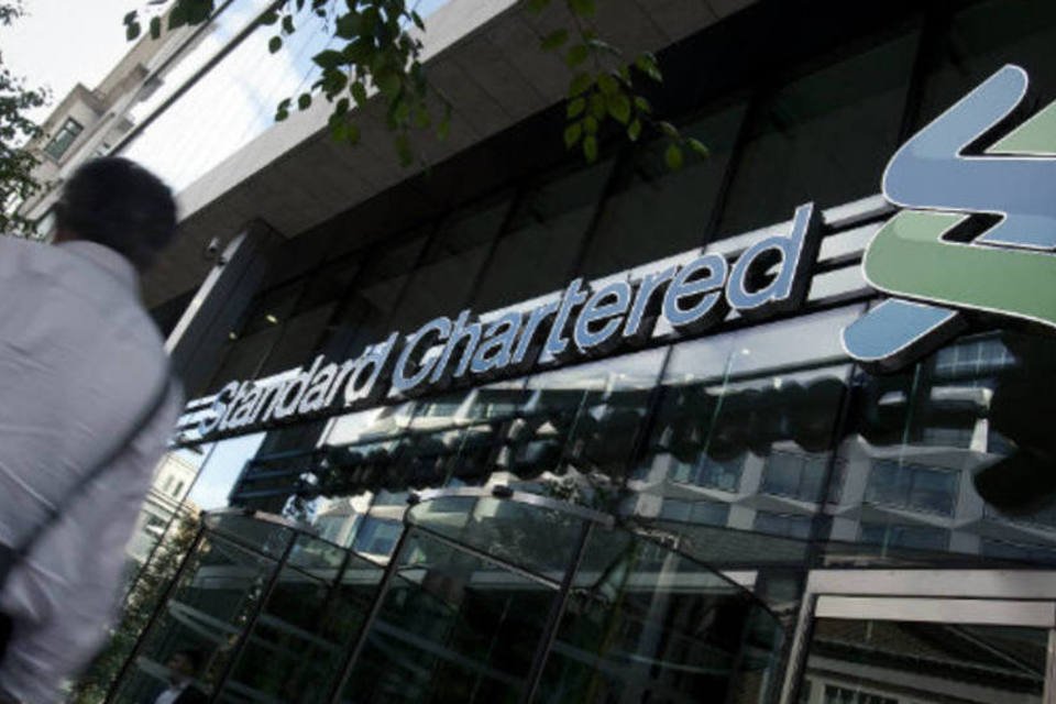 Standard Chartered tem queda no lucro do 1º semestre