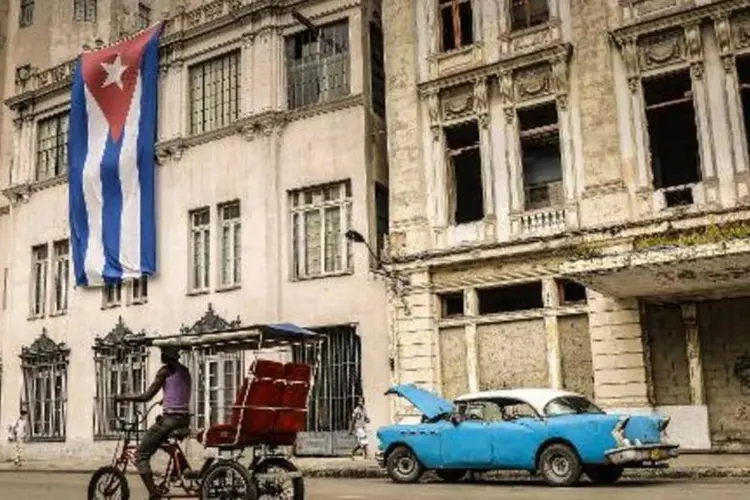 
	Havana: aproxima&ccedil;&atilde;o representa o abandono da pol&iacute;tica de san&ccedil;&otilde;es praticada h&aacute; d&eacute;cadas por Washington
 (Adalberto Roque/AFP)