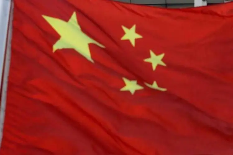 Bandeira: O setor de serviços da China conseguiu até agora enfrentar a desaceleração global muito melhor do que a indústria (Barry Huang/Reuters)