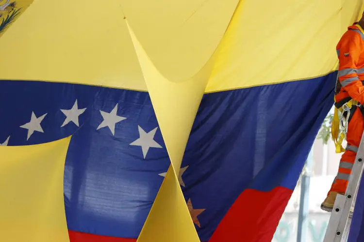 
	Elei&ccedil;&otilde;es na Venezuela: &quot;O di&aacute;logo e a coopera&ccedil;&atilde;o construtivos fortalecer&atilde;o as institui&ccedil;&otilde;es democr&aacute;ticas&quot;
 (Carlos Garcia Rawlins / Reuters)