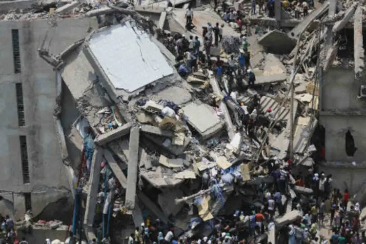 
	Desabamento de um edif&iacute;cio nos arredores de Daca, capital de Bangladesh: ao todo, 2.044 pessoas foram resgatadas dos escombros do pr&eacute;dio
 (REUTERS / Andrew Biraj)