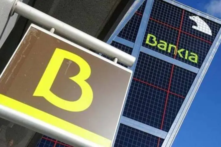 
	Bankia:&nbsp;Nacionalizado em maio para evitar a quebra, o Bankia, quarta entidade do pa&iacute;s em termos de ativos, solicitou uma ajuda recorde ao Estado espanhol
 (AFP/Dominique Faget)