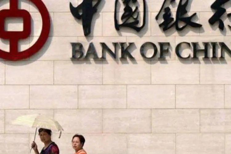 
	Banco da china: comiss&atilde;o regulat&oacute;ria banc&aacute;ria da China tamb&eacute;m reafirmou sua exig&ecirc;ncia de que a raz&atilde;o de empr&eacute;stimos para dep&oacute;sitos n&atilde;o pode ser maior que 75 por cento
 (Liu Jin/AFP)