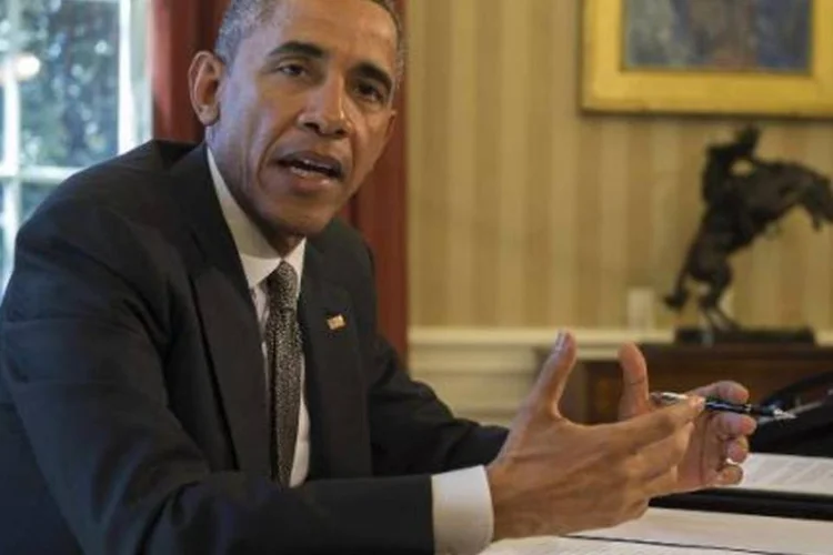 
	Segundo Obama, as sociedades &quot;n&atilde;o apagam totalmente da noite para o dia tudo o que aconteceu 200 ou 300 anos antes&quot;
 (Jim Watson/AFP)