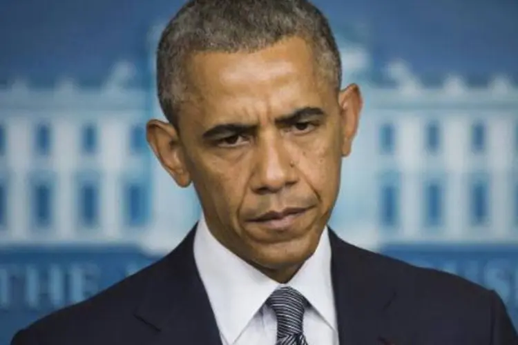 
	O presidente americano Barack Obama: Obama declarou que, com frequ&ecirc;ncia, ele teve de lamentar a morte de inocentes assassinados por pessoas que n&atilde;o tiveram nenhuma dificuldade em conseguir uma arma
 (Jim Watson/AFP)