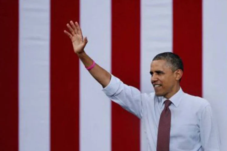 
	O presidente americano, Barack Obama, acena em evento de campanha em Nashua, New Hampshire: no total, 8% dos latinos registrados j&aacute; votaram de maneira antecipada
 (Chip Somodevilla/Getty Images/AFP)