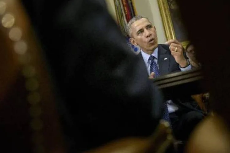 O presidente dos Estados Unidos, Barack Obama: "Netanyahu disse este será um acordo muito ruim. Que isto permitirá ao Irã recuperar 50 bilhões de dólares. Que o Irã não respeitará o acordo. Nada disto foi verificado" (Brendan Smialowski/AFP)