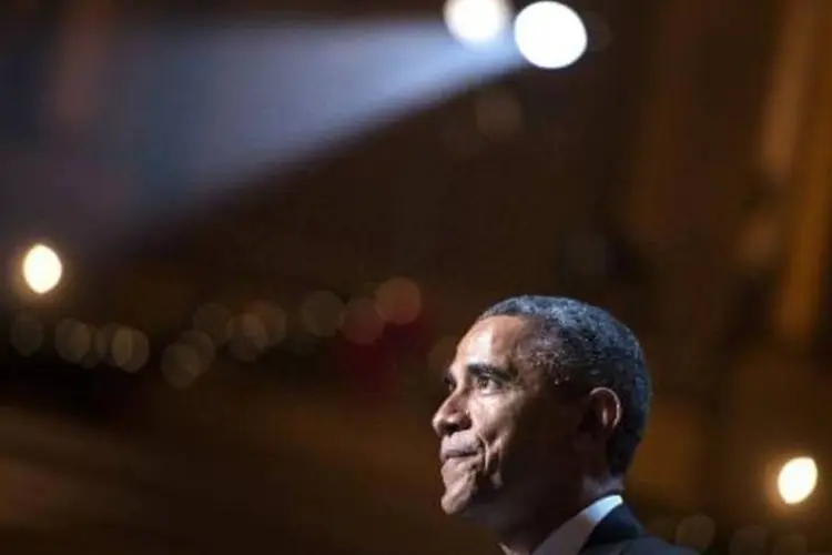 
	Obama: presidente americano conversou com seu colega cubano, Ra&uacute;l Castro, por telefone
 (Brendan Smialowski/AFP)