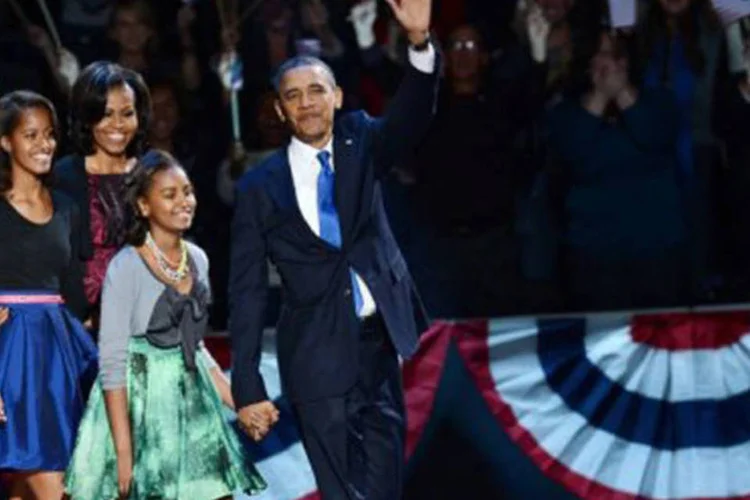 
	Barack Obama e sua fam&iacute;lia: entre os ve&iacute;culos &aacute;rabes, a imprensa digital eg&iacute;pcia destaca a vit&oacute;ria do atual l&iacute;der faz eco das rea&ccedil;&otilde;es da Irmandade Mu&ccedil;ulmana
 (Saul Loeb/AFP)