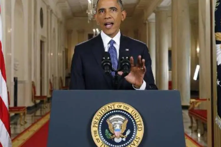 O presidente americano, Barack Obama, é visto em 20 de novembro de 2014, na Casa Branca, durante pronunciamento (Jim Bourg/AFP)