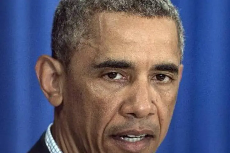 
	O presidente Barack Obama: Estados Unidos confirmou hoje o seu primeiro caso de ebola
 (Nicholas Kamm/AFP)