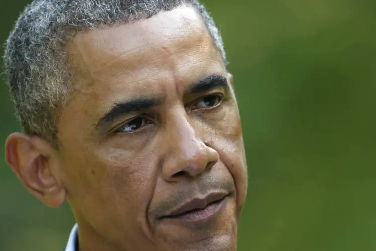 
	Obama: &quot;o mundo inteiro est&aacute; horrorizado pelo assassinato brutal de James Foley&quot;
 (Kevin Lamarque/Reuters)