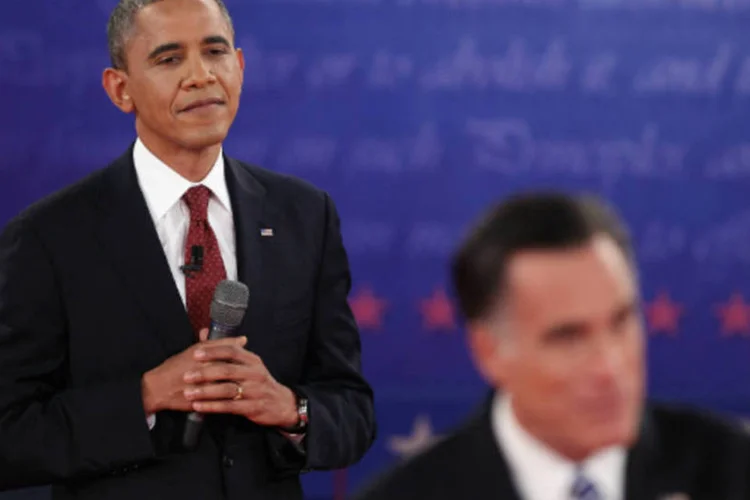 
	Barack Obama e Mitt Romney em segundo debate presidencial nos EUA:&nbsp;&quot;Romney n&atilde;o tem um plano com cinco pontos. Ele tem um plano com apenas um ponto&quot;, disse Obama
 (Getty Images / Scott Olson)