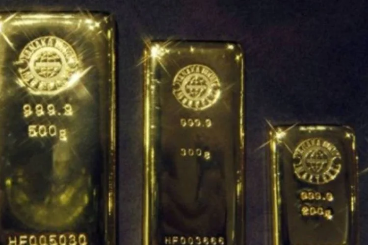 Os contratos de ouro mais negociados nesta última sessão da semana, os de vencimento em dezembro, somaram US$ 15 dólares por onça  (Yoshikazu Tsuno/AFP)