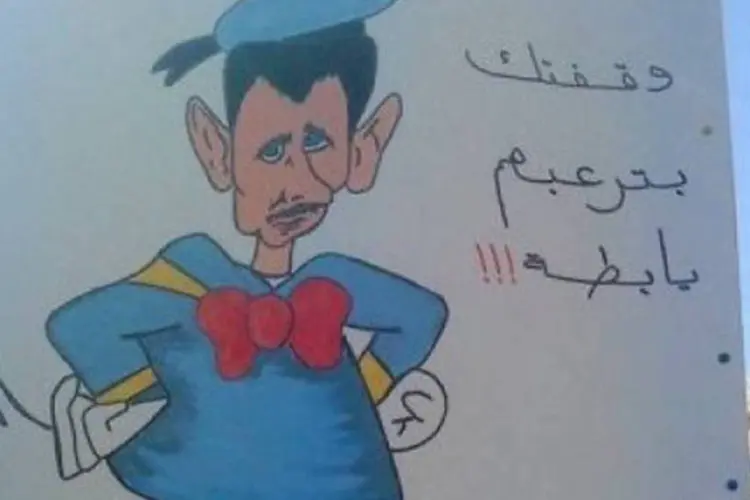 A web explodiu com centenas de piadas e caricaturas do chefe de Estado sírio caracterizado como o Pato Donald (AFP)